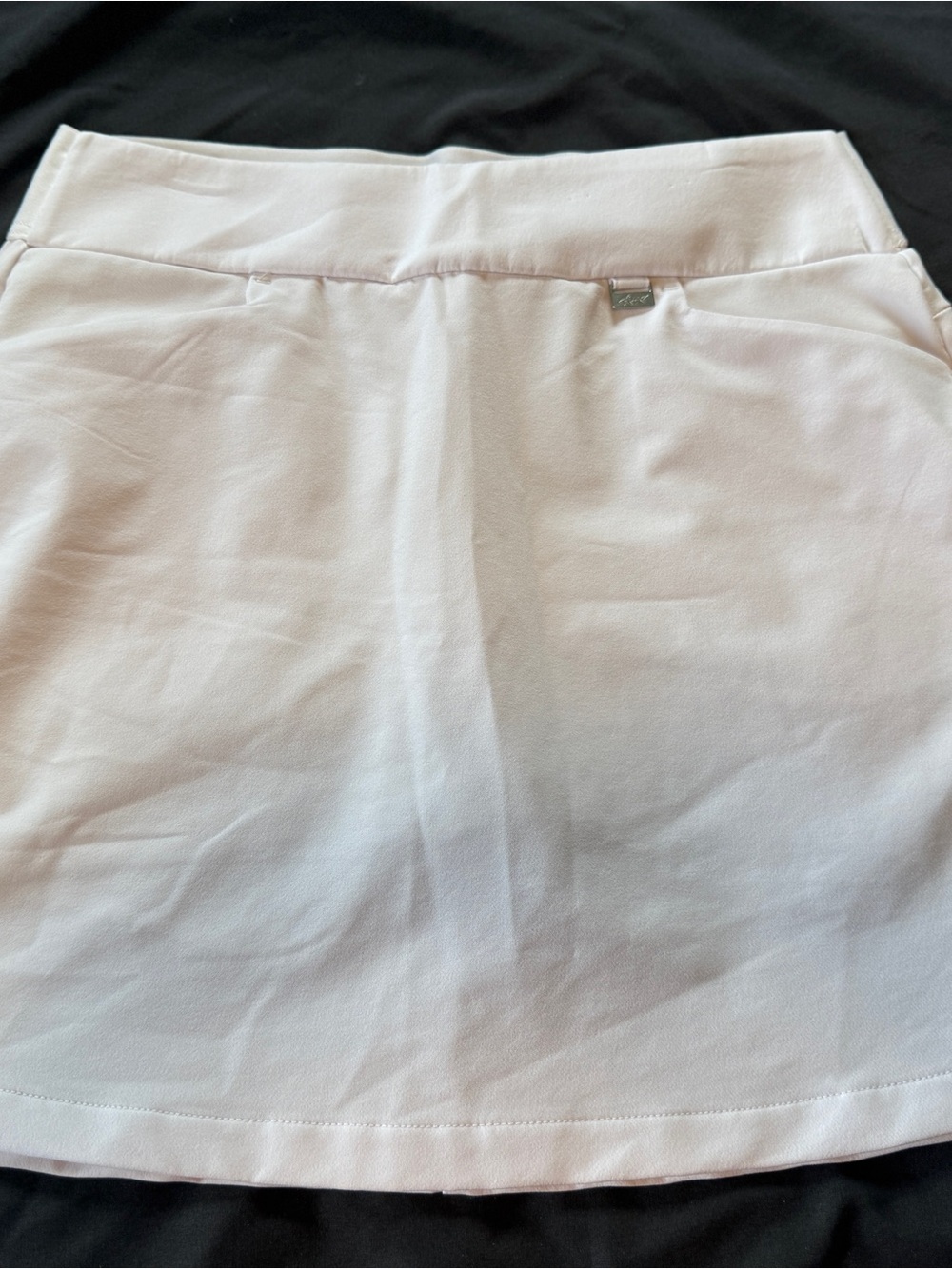 White Greg Norman Golf Skort with Metal Logo Tab size small